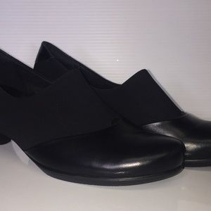 ecco black leather and fabric slip ons.